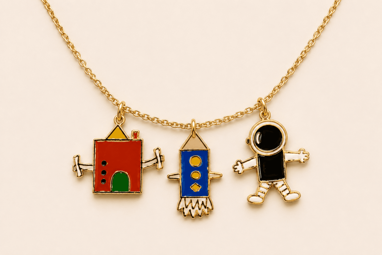 Finished custom charm necklace on a gold chain